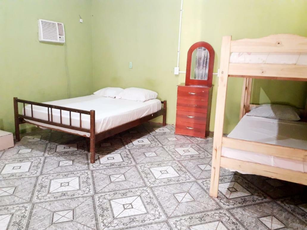 Alojamiento Picaflor Iguazu Hostel ปูแอร์โตอีกวาซู ภายนอก รูปภาพ